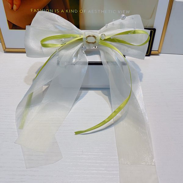 pearlescent mesh bow clasp clip high horsetail fixed hair clasp hair ornament new elegant ball hair clip headwear
pearlescent mesh bow clasp clip high horsetail fixed hair clasp hair ornament new elegant ball hair clip headwear