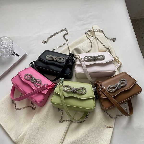 Outlet factory women shoulder bags 5 colors simple and versatile solid color flat leather handbag flip Western style backpack sweet bow buckle chain bag 5549#, Image colors
Outlet factory women shoulder bags 5 colors simple and versatile solid color flat leather handbag flip Western style backpack sweet bow buckle chain bag 5549#, Image colors