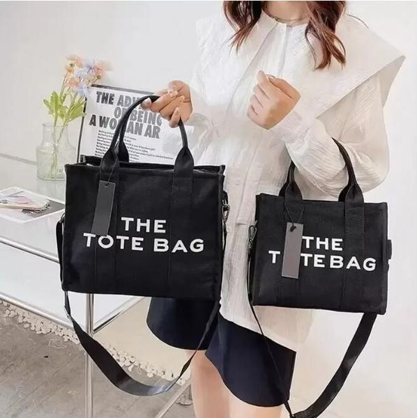 designer back with logo marc the tote bag women handbag shoulder bag canvas crossbody shopping luxury fashion totes bags black large handbag
designer back with logo marc the tote bag women handbag shoulder bag canvas crossbody shopping luxury fashion totes bags black large handbag