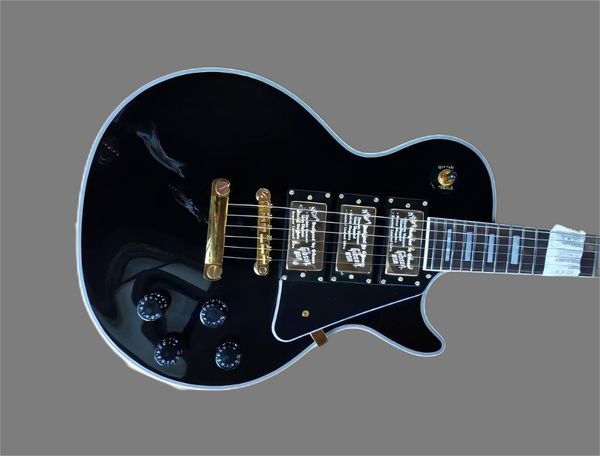custom electric guitar mahogany body ebony fingerboard gold hardware 3 pickup polished black
custom electric guitar mahogany body ebony fingerboard gold hardware 3 pickup polished black