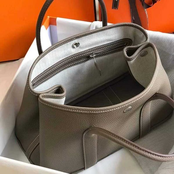party travel bag women quality shopping garden tote bag bucket picotin bags handmade luxurys designer handbags classic fashion togo leather
party travel bag women quality shopping garden tote bag bucket picotin bags handmade luxurys designer handbags classic fashion togo leather