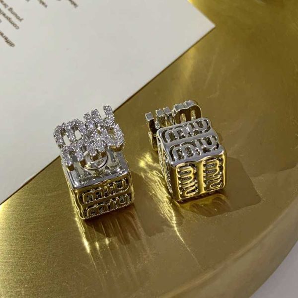 r miumiu fashion earrings hollow cube inlaid zircon miu letters temperament before and after wearing new luxury earrings luxury accessories, Golden
r miumiu fashion earrings hollow cube inlaid zircon miu letters temperament before and after wearing new luxury earrings luxury accessories, Golden
