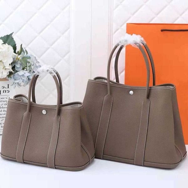 high authentic tote handbag designer bag garden party order wax thread leather women's togo portable large capacity shopping tlaa
high authentic tote handbag designer bag garden party order wax thread leather women's togo portable large capacity shopping tlaa