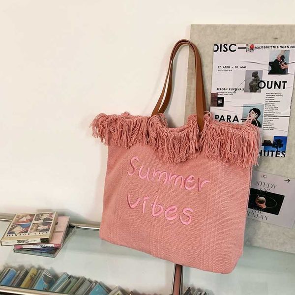 summer new tassel weaving canvas embroidery letter bag large capacity tote simple commuter shoulder
summer new tassel weaving canvas embroidery letter bag large capacity tote simple commuter shoulder