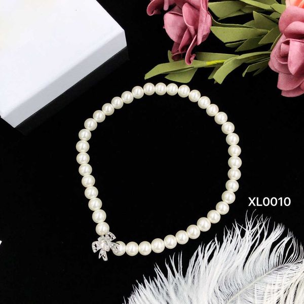 

Top Designer MiuMiu Fashion Pendant New Pearl Bow Super Immortal Cool Style Classic Simple Fashion Sweater Chain necklace Valentine's Day gift Accessories Jewelry