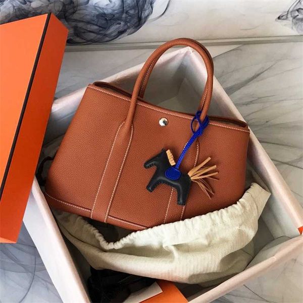 garden bag designer handmade wax line party togo cowhide business handbag leisure commuter tote women's zc nkux
garden bag designer handmade wax line party togo cowhide business handbag leisure commuter tote women's zc nkux