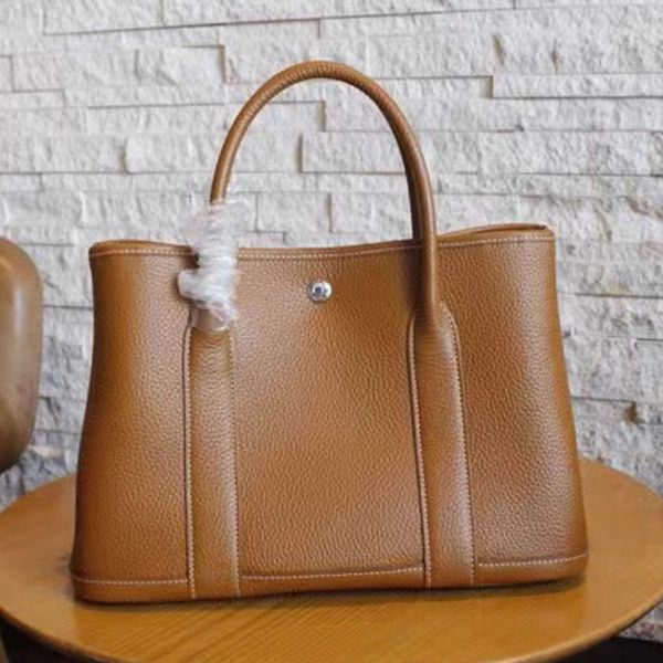 garden party shoulder bag shopping totes h bag cowhide lady handbag fashion designer large capacity wallets genuine leather classic retro wo
garden party shoulder bag shopping totes h bag cowhide lady handbag fashion designer large capacity wallets genuine leather classic retro wo
