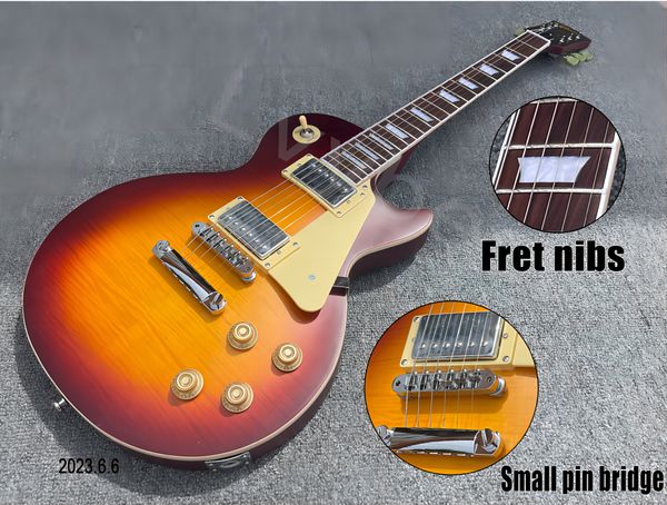 electric guitar black cherry explosion flame, chrome parts, cream pickguard, small needle, fret bridge, rosewood fingerboard
electric guitar black cherry explosion flame, chrome parts, cream pickguard, small needle, fret bridge, rosewood fingerboard