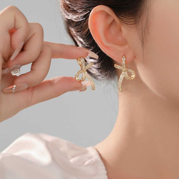 new zircon ribbon bow earrings with advanced design and versatile 925 silver needle personalized female earrings, Golden
new zircon ribbon bow earrings with advanced design and versatile 925 silver needle personalized female earrings, Golden