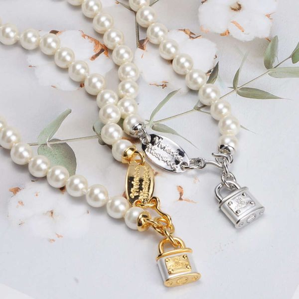 western empress dowager vivienne pearl lock necklace gold and sier lacquered shell beads saturn elements, Silver
western empress dowager vivienne pearl lock necklace gold and sier lacquered shell beads saturn elements, Silver