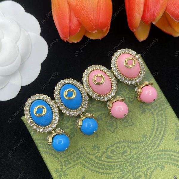 2023 new fashion pearl pendant charm earrings women's retro gold double letter interlocking brand designer earrings black powder blue o, Golden
2023 new fashion pearl pendant charm earrings women's retro gold double letter interlocking brand designer earrings black powder blue o, Golden