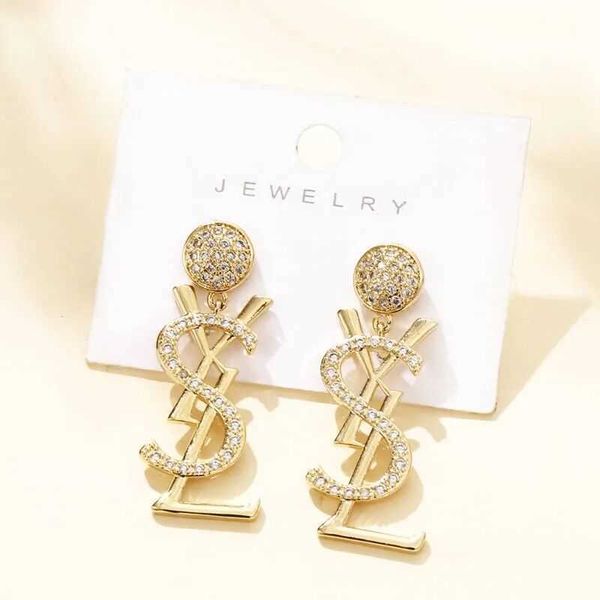 s925 silver needle copper micro inlaid letter earrings new fashion round face slim and long earrings for women, Golden
s925 silver needle copper micro inlaid letter earrings new fashion round face slim and long earrings for women, Golden