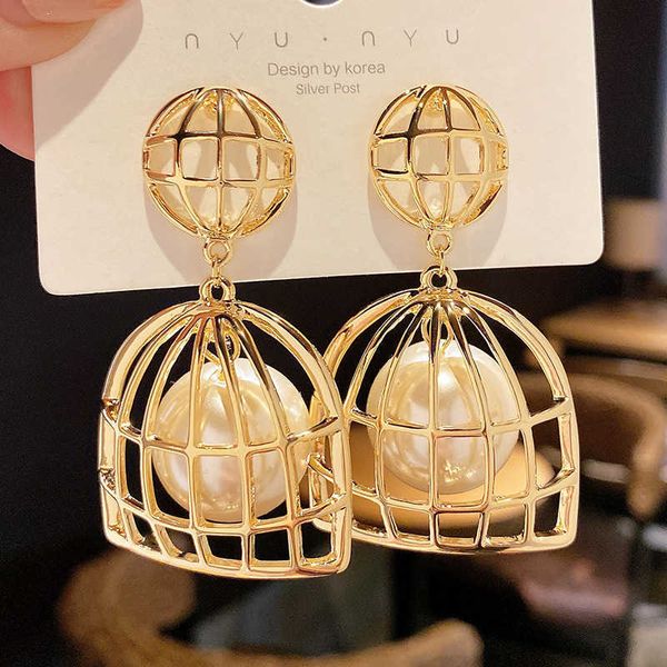 luyi exaggerates pearl birdcage earrings small design sense new trendy and high grade earrings, Golden
luyi exaggerates pearl birdcage earrings small design sense new trendy and high grade earrings, Golden