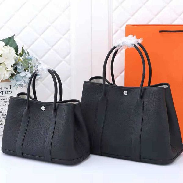 authentic handbag designer garden party tote bag high order wax thread leather women's bag togo leather bag tote bag portable large cap
authentic handbag designer garden party tote bag high order wax thread leather women's bag togo leather bag tote bag portable large cap