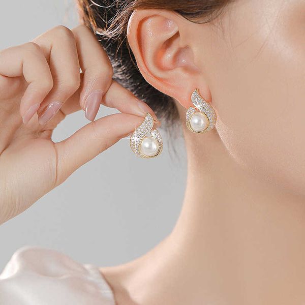 new zircon inlaid pearl flame earrings with advanced sense light luxury earrings trendy women's small fragrance style earrings silver n, Black
new zircon inlaid pearl flame earrings with advanced sense light luxury earrings trendy women's small fragrance style earrings silver n, Black