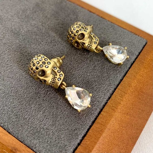 fashion designer alexander queen skeleton head full diamond earrings for women with advanced sense and personalized feng shui drop pendant e, Golden
fashion designer alexander queen skeleton head full diamond earrings for women with advanced sense and personalized feng shui drop pendant e, Golden