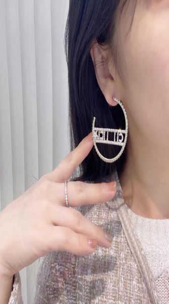 2023 luxury quality charm round shape drop earring with diamond and hollow design words in 18k gold plated have box stamp ps7962a5522241, Golden 
2023 luxury quality charm round shape drop earring with diamond and hollow design words in 18k gold plated have box stamp ps7962a5522241, Golden