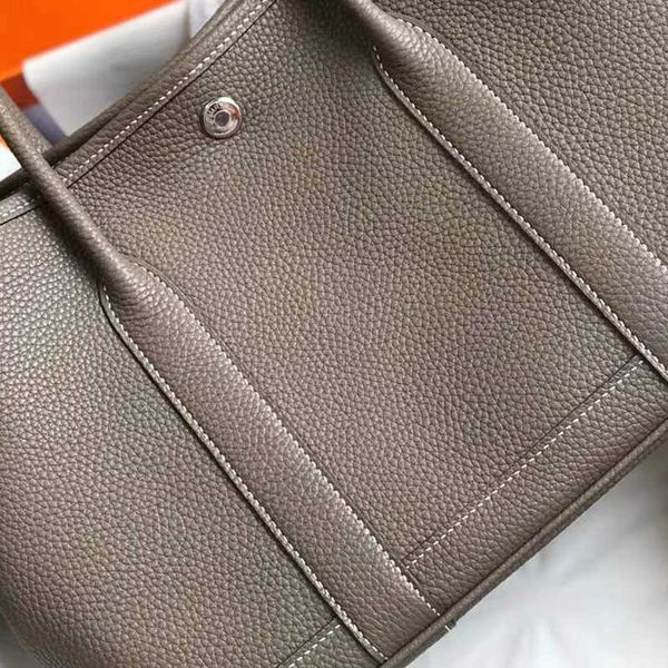 7a garden party bag women purse designer tote bucket bags handmade luxury designer handbags classic fashion togo leather wallet sac de luxe
7a garden party bag women purse designer tote bucket bags handmade luxury designer handbags classic fashion togo leather wallet sac de luxe