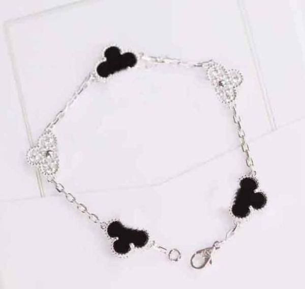 v gold material luxurious quality five bracelet with diamond and black agate no change and no fade for women wedding jewelry gift 6742208, Golden;silver 
v gold material luxurious quality five bracelet with diamond and black agate no change and no fade for women wedding jewelry gift 6742208, Golden;silver