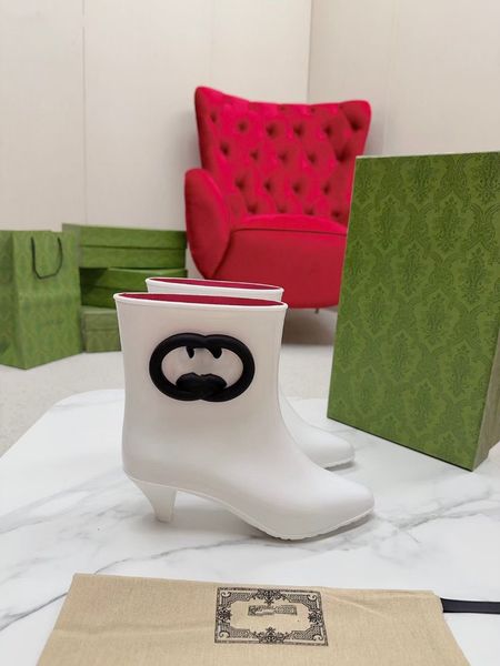 gglatest rain boots. exclusive open, interlocking double g's take on a new look in this glossy rubber ankle boot5, Black
gglatest rain boots. exclusive open, interlocking double g's take on a new look in this glossy rubber ankle boot5, Black