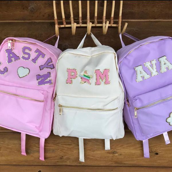 backpack letter patches nylon backpack women simple fashion large capacity backpacks durable waterproof schoolbag for teenage girls 230822
backpack letter patches nylon backpack women simple fashion large capacity backpacks durable waterproof schoolbag for teenage girls 230822