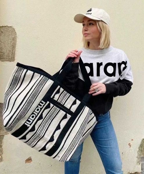 isabel marant designer canvas tote bag outdoor large capacity commuting shopping bag casual striped letter printed one shoulder handbag satc
isabel marant designer canvas tote bag outdoor large capacity commuting shopping bag casual striped letter printed one shoulder handbag satc