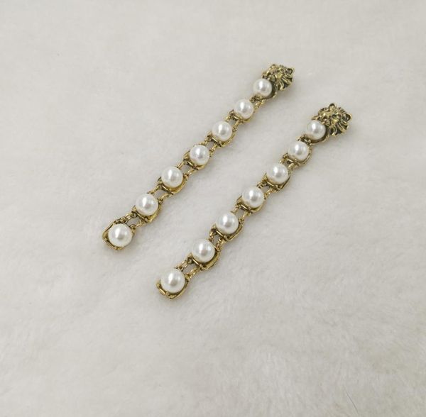 baroque vintage metal lion head stud earrings for women fashion brand wedding jewelry pearl earrings pendant bridal brincos3300434, Golden;silver
baroque vintage metal lion head stud earrings for women fashion brand wedding jewelry pearl earrings pendant bridal brincos3300434, Golden;silver