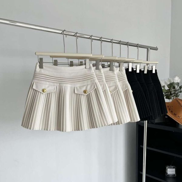 fashioned metal skirt button woolen high waist slimming short a line pleated women early autumn and winter, Black
fashioned metal skirt button woolen high waist slimming short a line pleated women early autumn and winter, Black