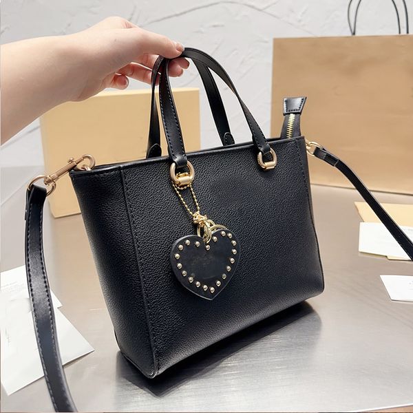 pure leather shoulder bag large capacity shopping bags totes solid color hardware letter heart charm pendant rivet zipper double pockets han
pure leather shoulder bag large capacity shopping bags totes solid color hardware letter heart charm pendant rivet zipper double pockets han
