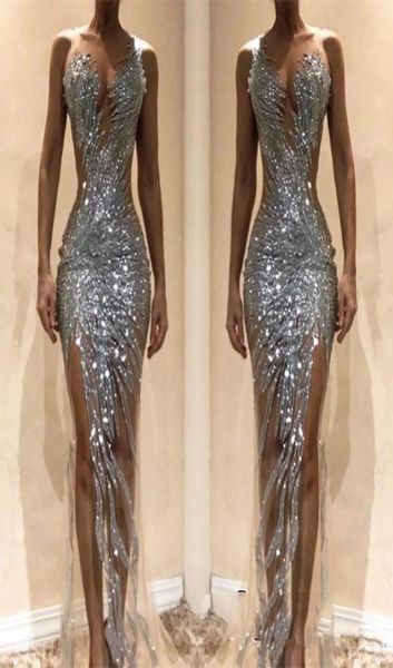 2019 nigerian silver sequins beaded mermaid formal prom dresses custom made sleeveless sheer neck side split pageant party go9418591, White;red
2019 nigerian silver sequins beaded mermaid formal prom dresses custom made sleeveless sheer neck side split pageant party go9418591, White;red