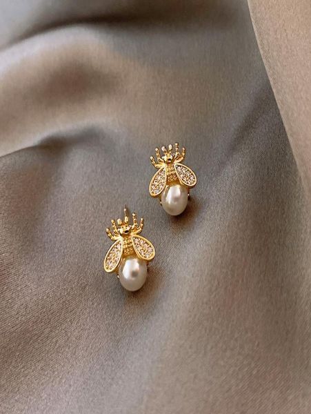 2021 new trendy simple and luxurious pearl earring charm lady design sense bee insect earrings jewelry for women girls party weddi1736436, Golden
2021 new trendy simple and luxurious pearl earring charm lady design sense bee insect earrings jewelry for women girls party weddi1736436, Golden