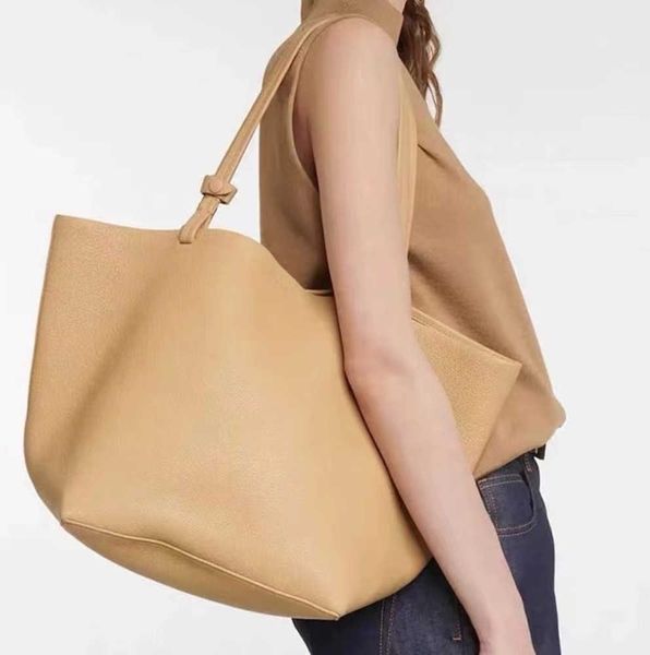 new designer bag the row handbag large capacity commuter fashion women leather shoulder cross french minority
new designer bag the row handbag large capacity commuter fashion women leather shoulder cross french minority