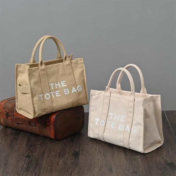 2022 new fashion ladies tote shopping bag marc handbag large capacity shoulder crossbody women canvas wallet purse clutch 32cm209j, Black;red
2022 new fashion ladies tote shopping bag marc handbag large capacity shoulder crossbody women canvas wallet purse clutch 32cm209j, Black;red