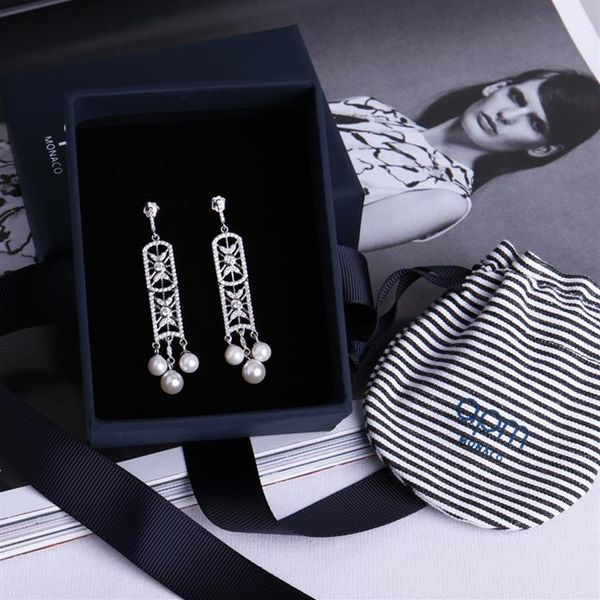 european and american fashion dangle a diamond retro versatile hollow out shield pearl pendant women's earrings333q, Silver
european and american fashion dangle a diamond retro versatile hollow out shield pearl pendant women's earrings333q, Silver