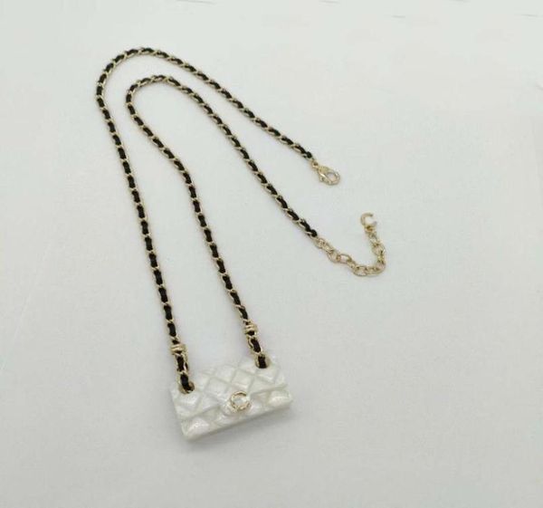 2023 luxury quality charm handbag pendant necklace in two colors pink and white with black genuine leather have box stamp ps7538a8739102, Silver
2023 luxury quality charm handbag pendant necklace in two colors pink and white with black genuine leather have box stamp ps7538a8739102, Silver