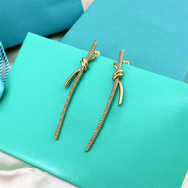 tassel style titanium steel fashionable classic women's earrings designer gold charm versatile trendy gathering gift earrings for frien, Golden
tassel style titanium steel fashionable classic women's earrings designer gold charm versatile trendy gathering gift earrings for frien, Golden