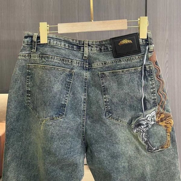 men's jeans designer med stacked embroidered jeans men slim fit small feet straight leg pants trousers, Blue
men's jeans designer med stacked embroidered jeans men slim fit small feet straight leg pants trousers, Blue