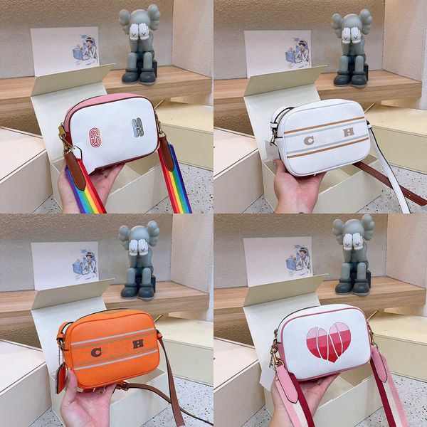 designer camera bag purse luxurys handbags women cute heart rainbow snapsshoulder bags wide strap cross body hand bag crossbody wallet 23081
designer camera bag purse luxurys handbags women cute heart rainbow snapsshoulder bags wide strap cross body hand bag crossbody wallet 23081