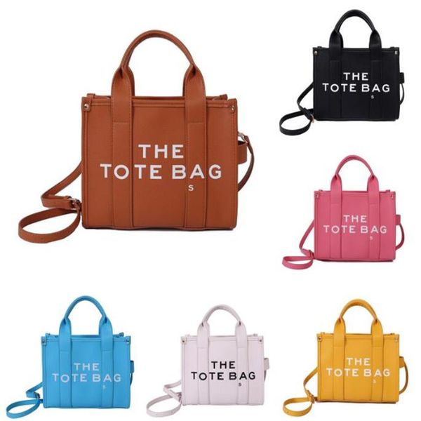 the tote bag womens lady designer wallets coin purse practical handbag large famous capacity shoulder handbags crossbody264j
the tote bag womens lady designer wallets coin purse practical handbag large famous capacity shoulder handbags crossbody264j