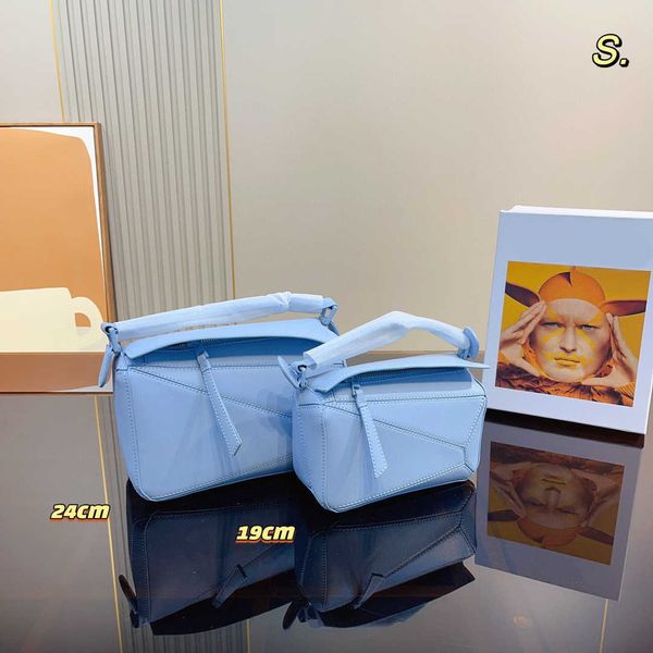 5a genuine leather handbag geometric square solid color messenger bag luxury designer brand shoulder bag detachable wide strap camera bag wi
5a genuine leather handbag geometric square solid color messenger bag luxury designer brand shoulder bag detachable wide strap camera bag wi