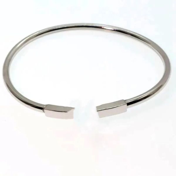 designer 18k gold bracelet double t shaped diamond highly polished c-shaped fashion white shell open bracelet coil ladies bracelet., Black
designer 18k gold bracelet double t shaped diamond highly polished c-shaped fashion white shell open bracelet coil ladies bracelet., Black
