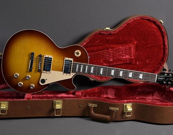 paul standard 60''s iced tea electric guitar as same of the pictures 
paul standard 60''s iced tea electric guitar as same of the pictures