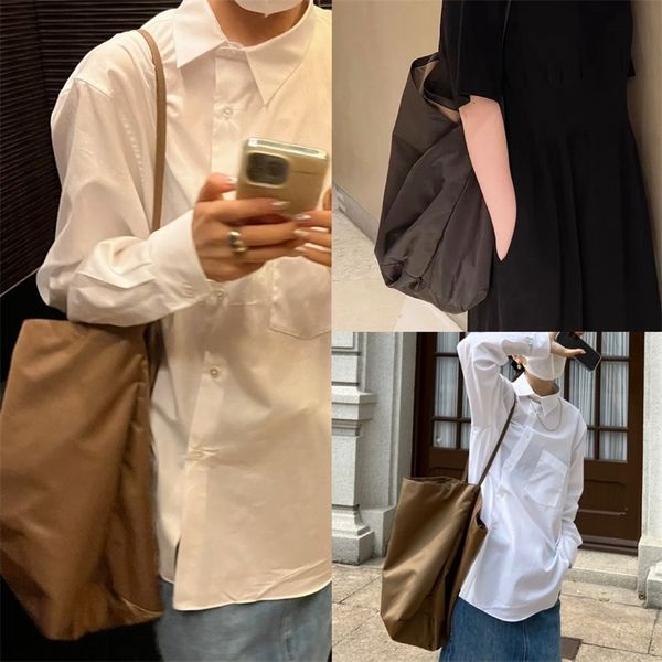 evening bags the nylon bucket bag cloud niche highend feeling large capacity commuting tote row women's shoulder 230824
evening bags the nylon bucket bag cloud niche highend feeling large capacity commuting tote row women's shoulder 230824