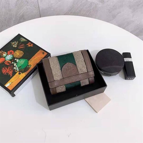 the new classic red and green stripe card wallet folded type hand bag men and women wallets leather267s, Red;black
the new classic red and green stripe card wallet folded type hand bag men and women wallets leather267s, Red;black