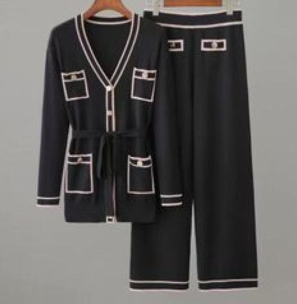 designer women tracksuits pink long sleeved knitted set with lace up waist, medium length v-neck cardigan and wide leg pants, two-piece set, Gray
designer women tracksuits pink long sleeved knitted set with lace up waist, medium length v-neck cardigan and wide leg pants, two-piece set, Gray
