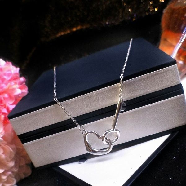 2023 lovely cute pendant necklaces long silver thin stainless steel chain heart ring key design women necklace with dust bag and box
2023 lovely cute pendant necklaces long silver thin stainless steel chain heart ring key design women necklace with dust bag and box