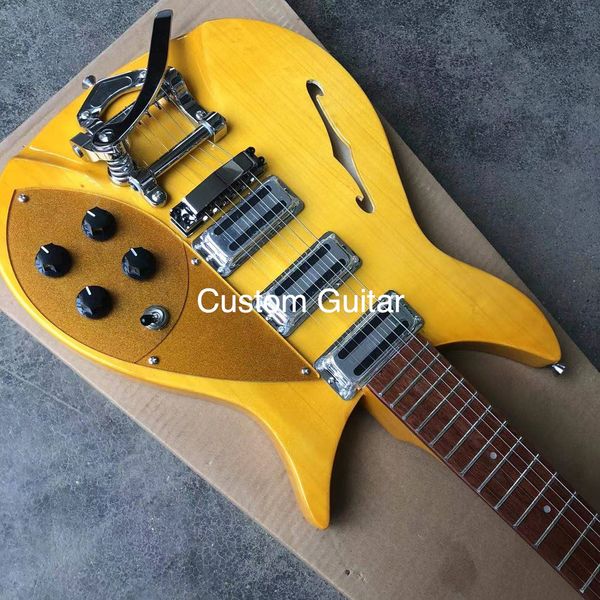 deluxe custom 6 strings rick electric guitar f hole 325 style trembol bigs in yellow color
deluxe custom 6 strings rick electric guitar f hole 325 style trembol bigs in yellow color