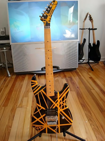 eddie edward van halen electric guitar, yellow stripes, black, floyd rose, bridge vibrato, beige neck and fingerboard, rare
eddie edward van halen electric guitar, yellow stripes, black, floyd rose, bridge vibrato, beige neck and fingerboard, rare