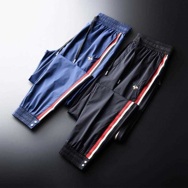 ice silk men's pants summer thin quick dried sports casual small feet cropped fashion brand tie guard pantsw912, Black
ice silk men's pants summer thin quick dried sports casual small feet cropped fashion brand tie guard pantsw912, Black