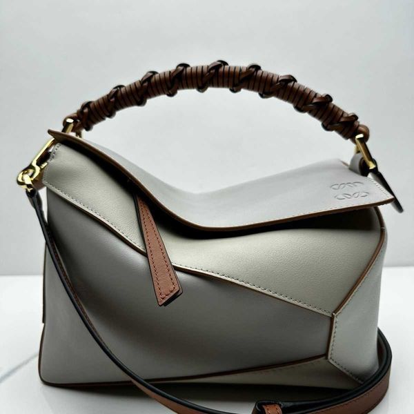 puzzles high-end designer geometric shoulder bag lowe wrist woven wallet 1:1 calfskin crossbody bag
puzzles high-end designer geometric shoulder bag lowe wrist woven wallet 1:1 calfskin crossbody bag